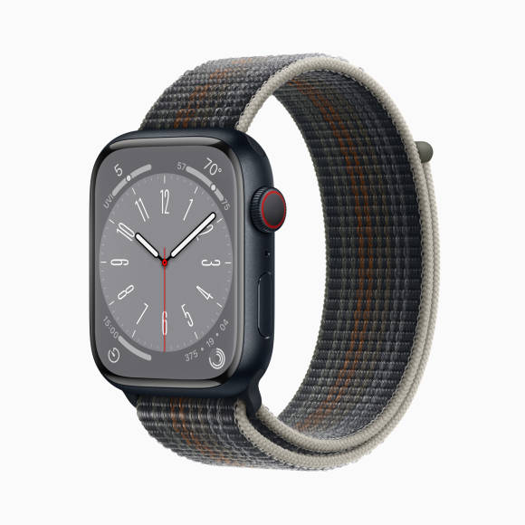 Das Foto zeigt eine dunkelgraue Apple Watch mit dem «Sport Loop»; das Zifferblatt zeigt eine dunkelgraue, analoge Darstellung
