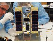 Attaching_solar_panels_to_STRaND-1-1-lores_75dpi.jpg