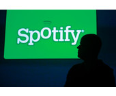 Daniel_Ek_profile_and_the_Spotify_logo.jpg